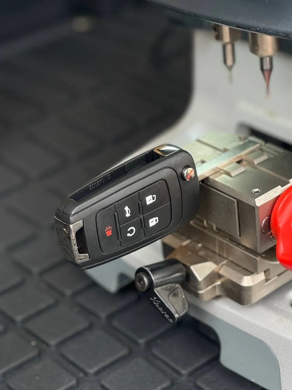 New Chevrolet flip key cut on the key machine in our vehicle
